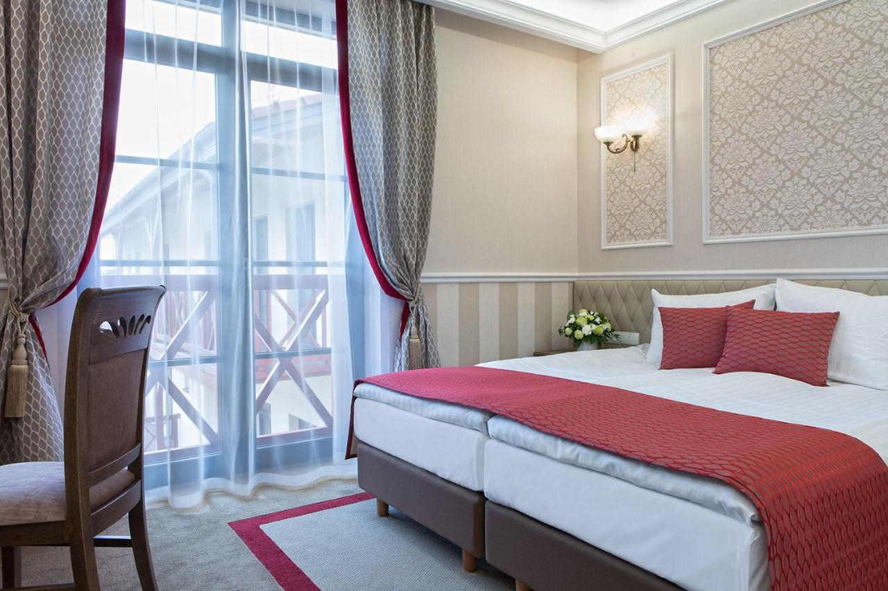 تشيخوتشينيك Boutique Odyseja & Spa المظهر الخارجي الصورة A room at the hotel